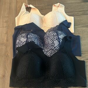 Three brand new Comfit bras. Wrong size for me but great quality and pretty.